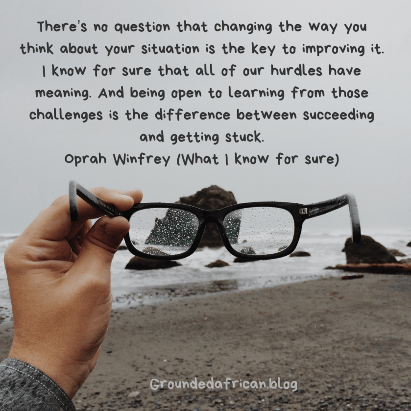 A view of the sea through outstretched glasses on a cloudy day. Quote by Oprah Winfrey
