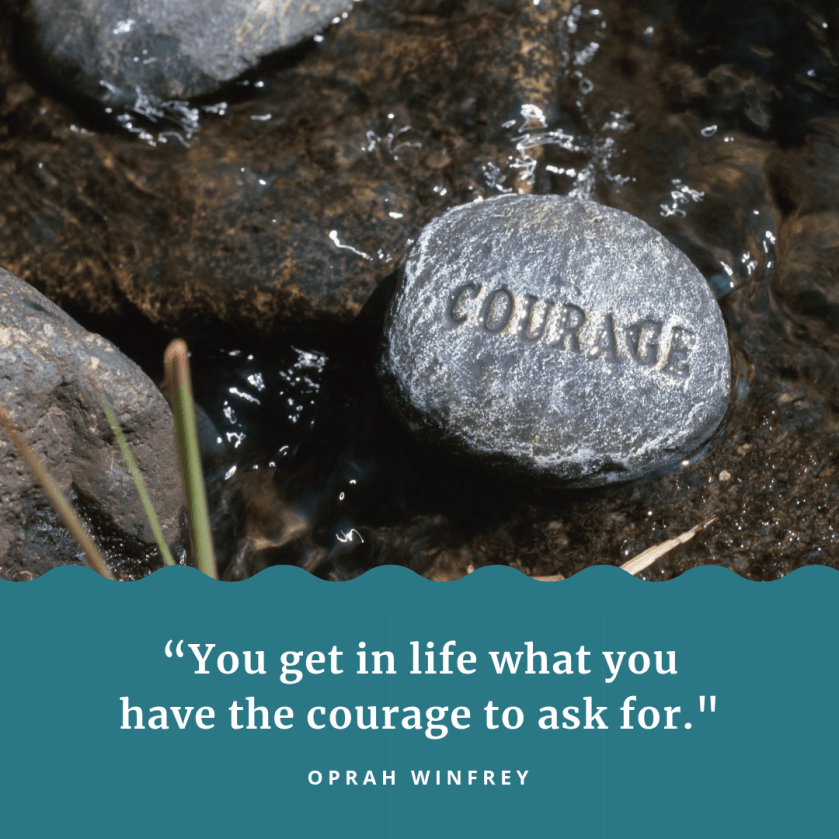 Stone in stream with the word Courage engraved on it. Quote by Oprah about courage 