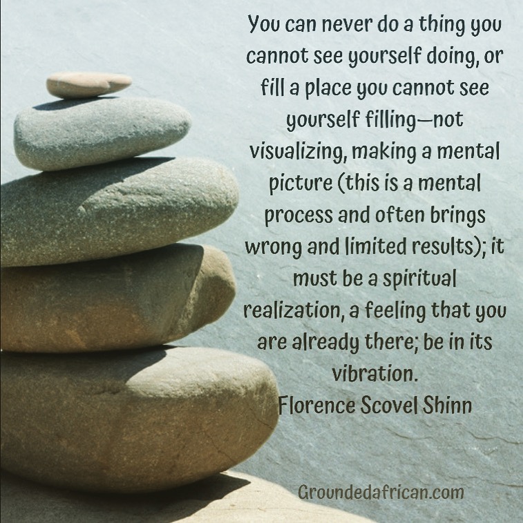 Balancing stones against a watery background. Quote by Florence Scovel Shinn 