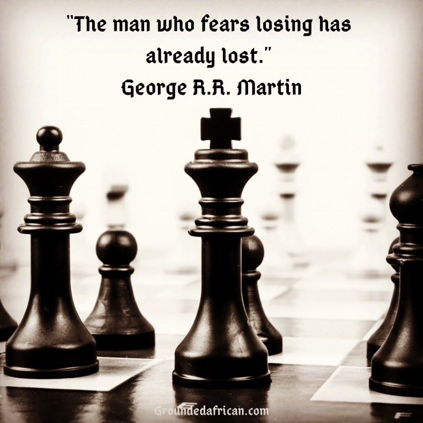Chess pieces on a board. Quote by George R.R. Martin
