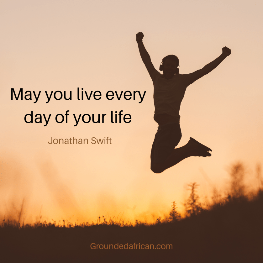 Person with headphones jumping for joy. Quote by Jonathan Swift 