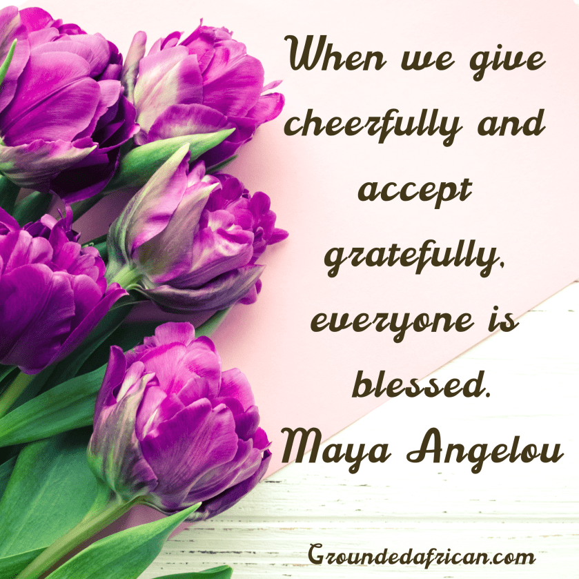 Pink flowers against a pink cloth on a cream table