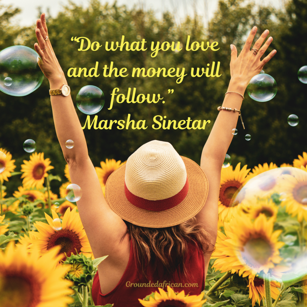 Woman in sunflower field with bubbles